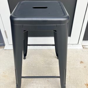Black metal bar stool available for hire from Little Black Door, Brisbane