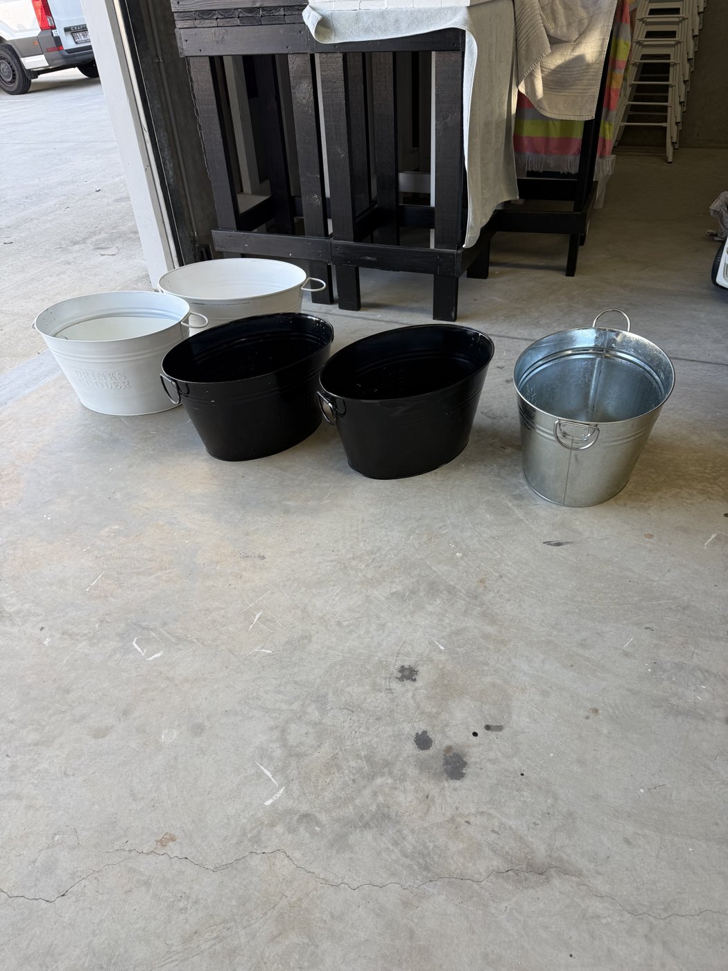 Range of ice buckets and tubs in white, black and galvanised metal