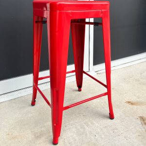 Red metal bar stool available for hire from Little Black Door, Brisbane