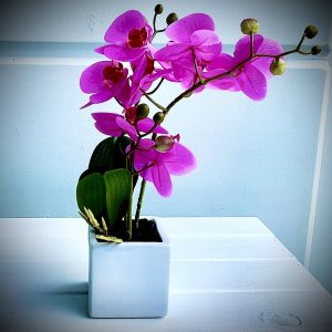 Pink orchid table topper centrepiece